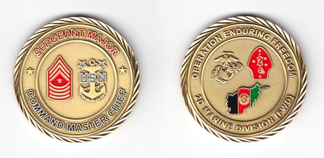 Round shaped, brass colored coin, 2 inches in diameter.