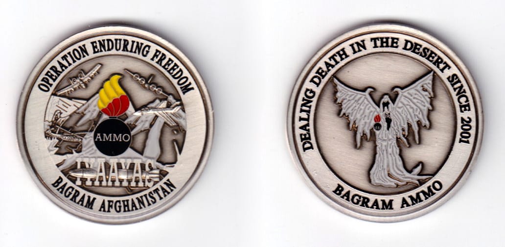 Round shaped, silver colored coin, 2 inches in diameter.