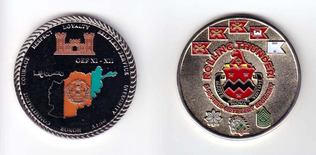 Round shaped, gold colored coin, 2 inches in diameter.