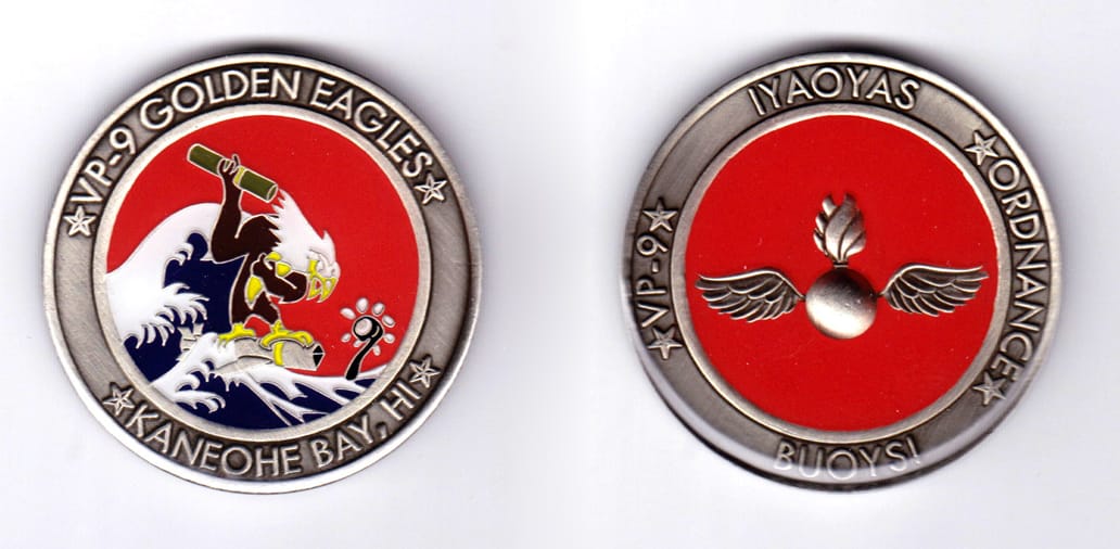 Round shaped, pewter colored coin, 2 inches in diameter.