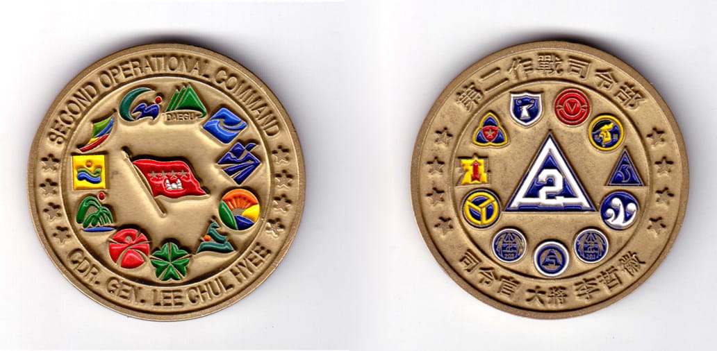 Round shaped, bronze colored coin, 2 inches in diameter.