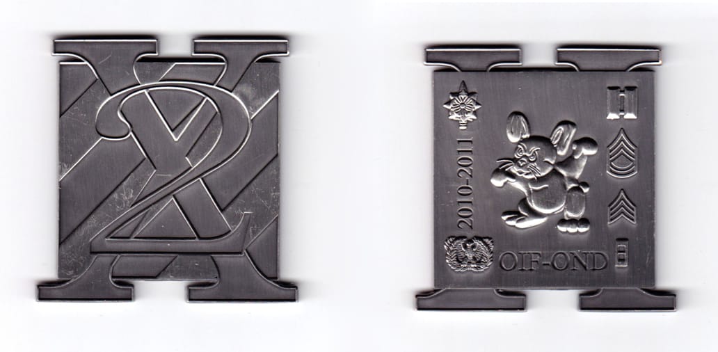 Square shaped coin with an overprinted letter "X" protruding at top and bottom, pewter in color, 2 1/4 inches high x 2 1...