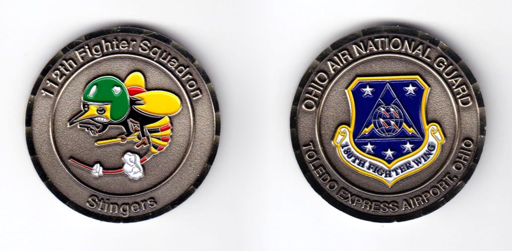 Round shaped coin, antique brass in color, 1 3/4 inches in diameter.