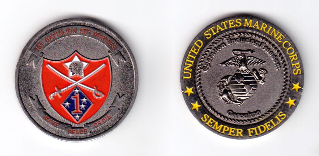 Round shaped coin, pewter in color, 1 3/4 inches in diameter.