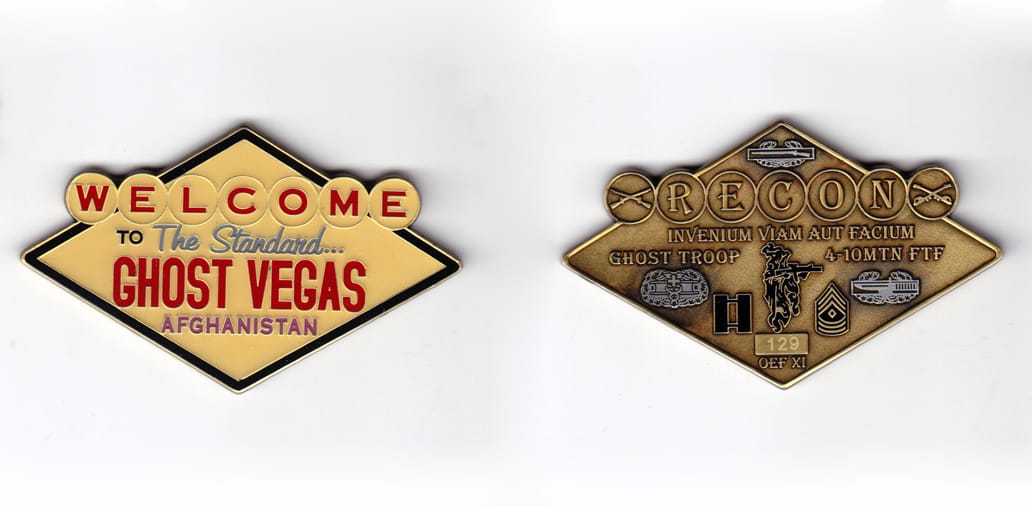 Diamond shaped coin with the word "WELCOME" overprinted and protruding from both sides of the top 1/3 of the coin, antiq...