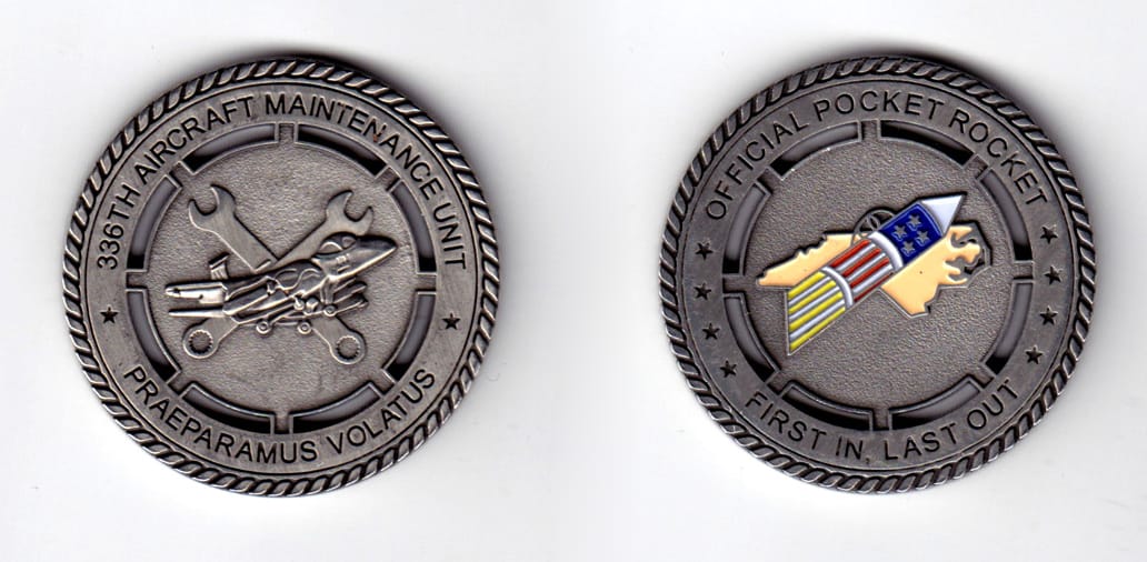 Round shaped coin, pewter in color, 1 3/4 inches in diameter.