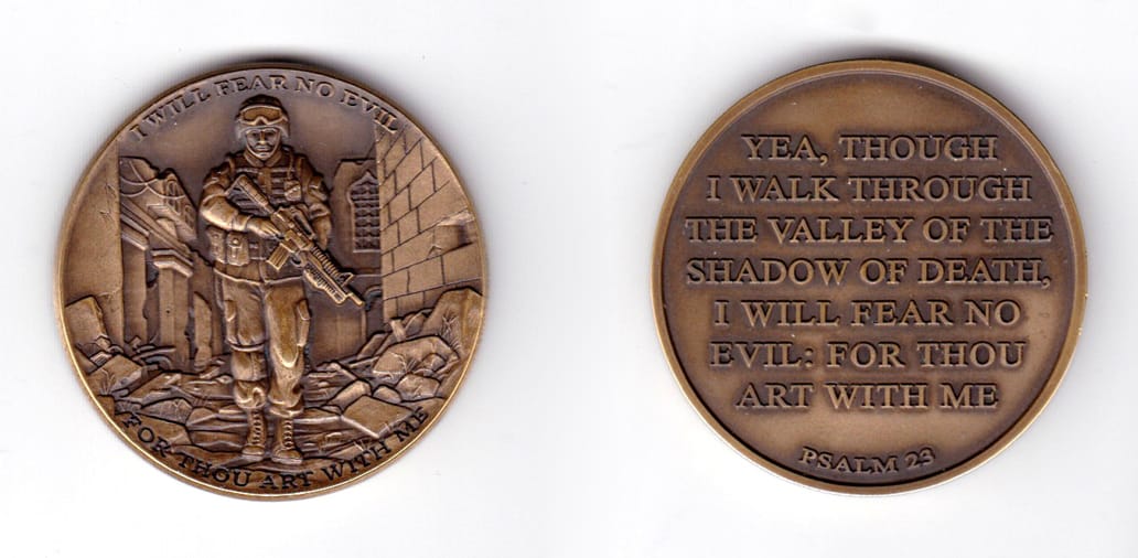 Round shaped coin, antique brass in color, 1 3/4 inches in diameter.