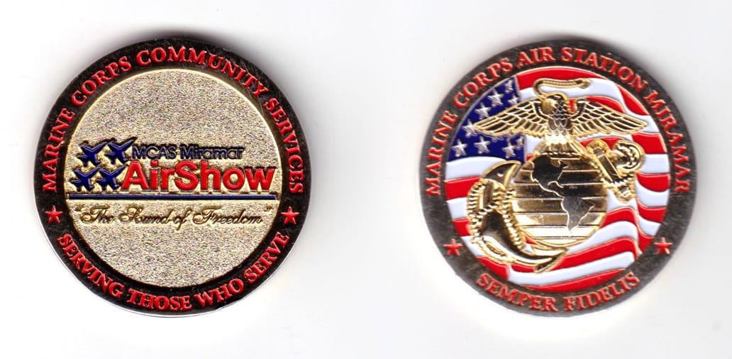 Round shaped coin, brass in color, 1 3/4 inches in diameter.