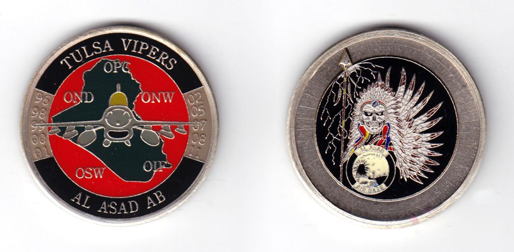 Round shaped coin, pewter in color, 1 3/4 inches in diameter.