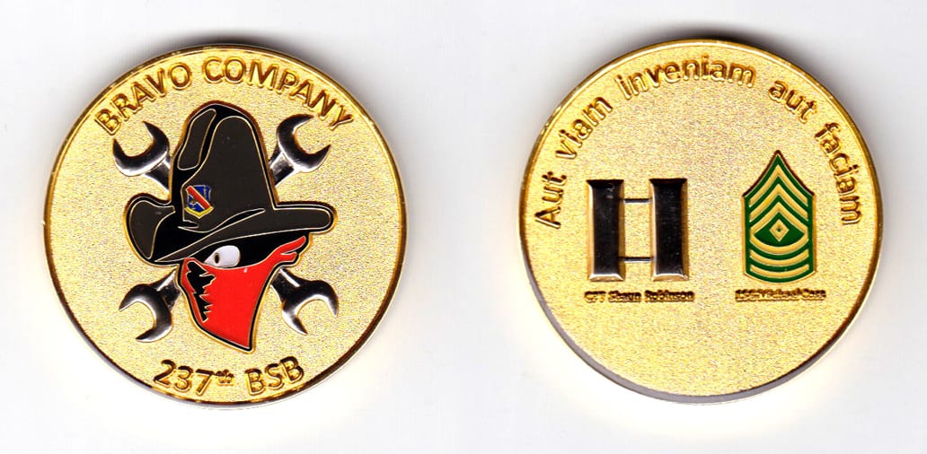 Round shaped coin, brass in color, 1 3/4 inches in diameter.