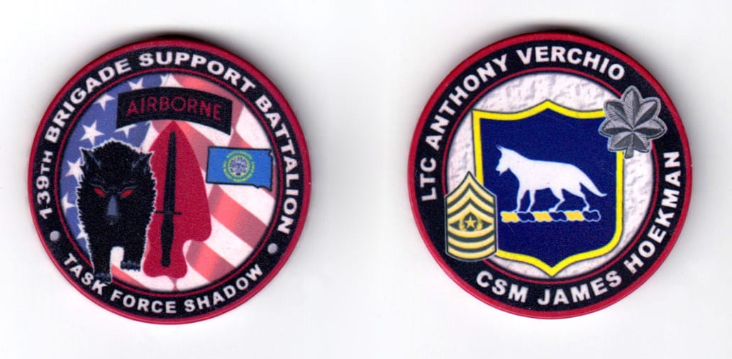 Round shaped poker chip, burgandy and blue in color, 1 3/4 inches in diameter.