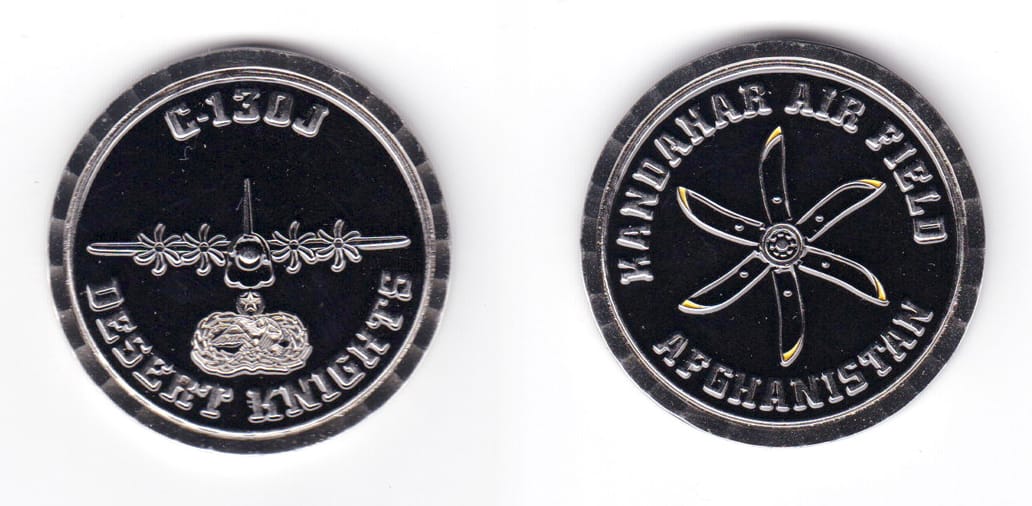 Round shaped coin, silver in color, 1 3/4 inches in diameter.