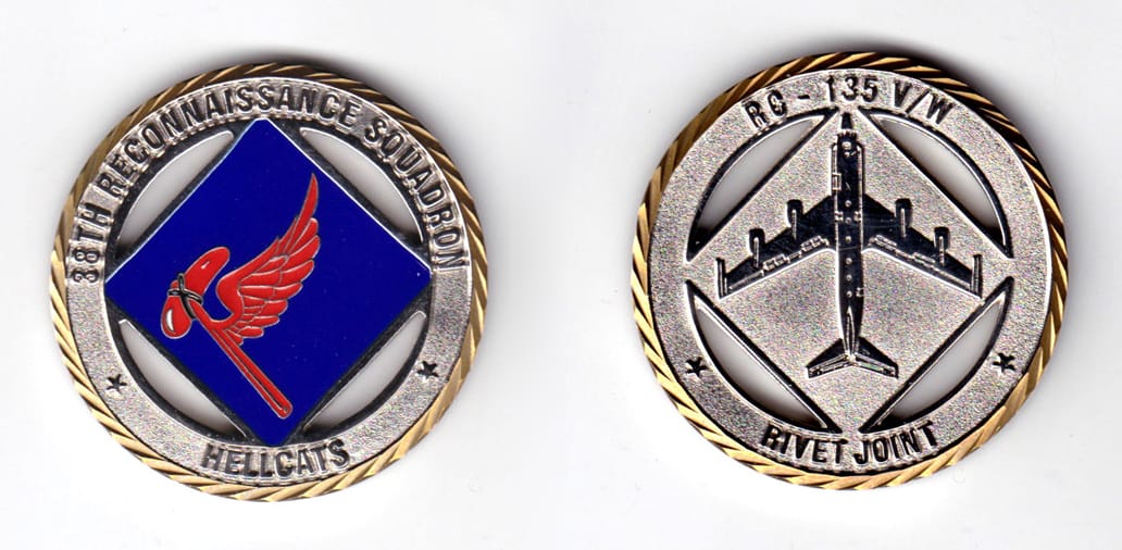 Round shaped coin, pewter in color, 1 3/4 inches in diameter.