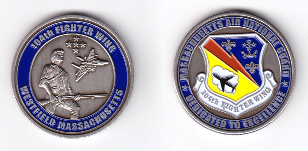 Round shaped coin, pewter in color, 1 5/8 inches in diaameter.