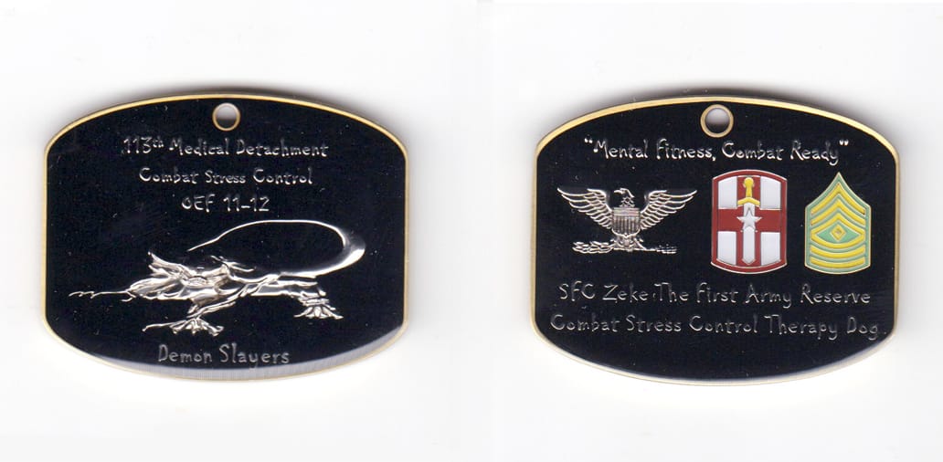 Rectangular shaped coin with top and bottom sides bowed outward, antique brass in color, 1 1/2 inches high x 2 inches wi...