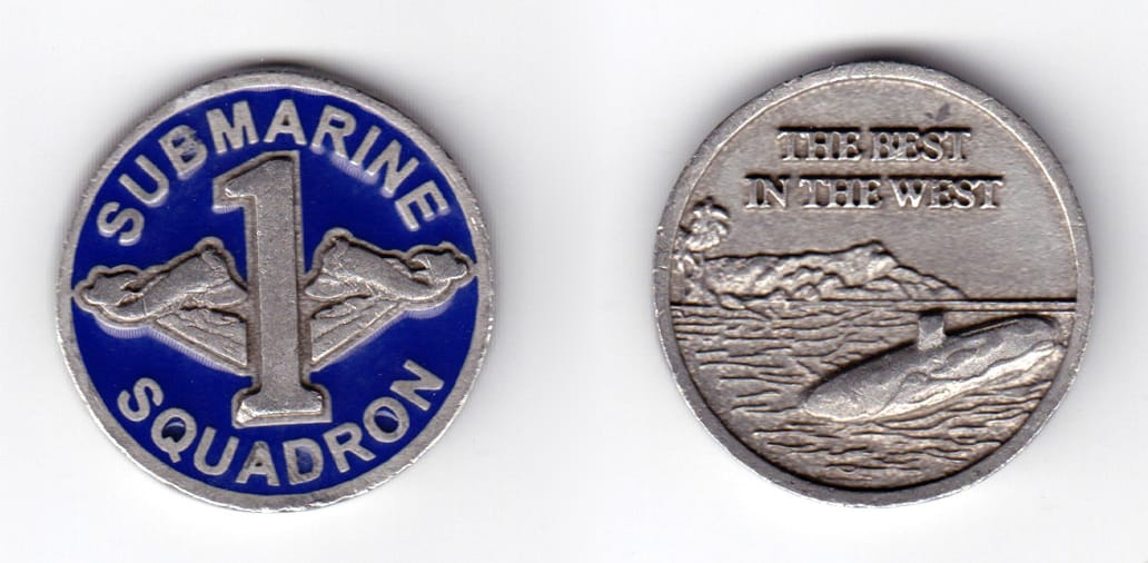 Round shaped coin, pewter in color, 1 17/32 inches in diameter.