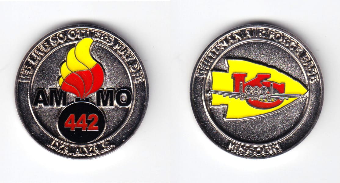 Round shaped coin, silver in color, 1 1/2 inches in diameter.