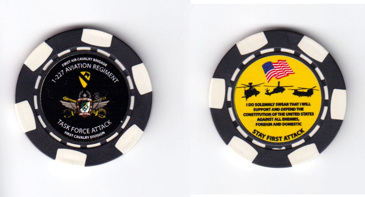 Round shaped poker chip, black in color, 1 37/64 inches in diameter.