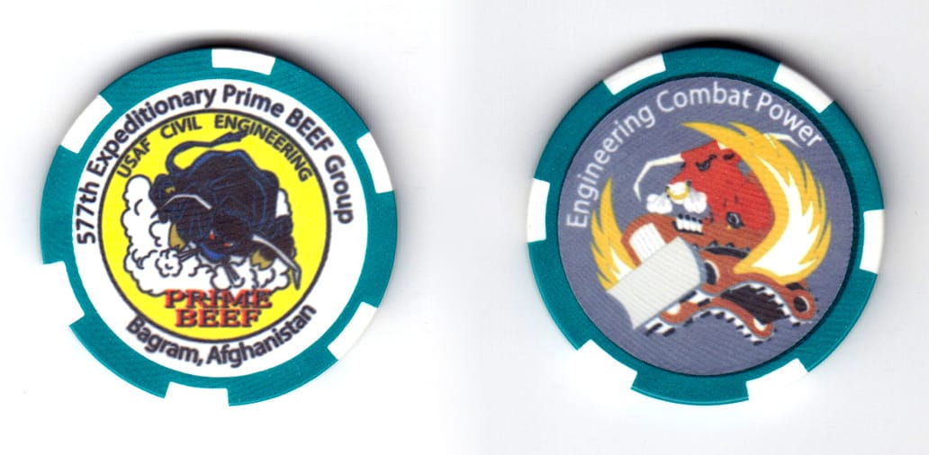 Round shaped poker chip, green and white in color, 1 9/16 inches in diameter.