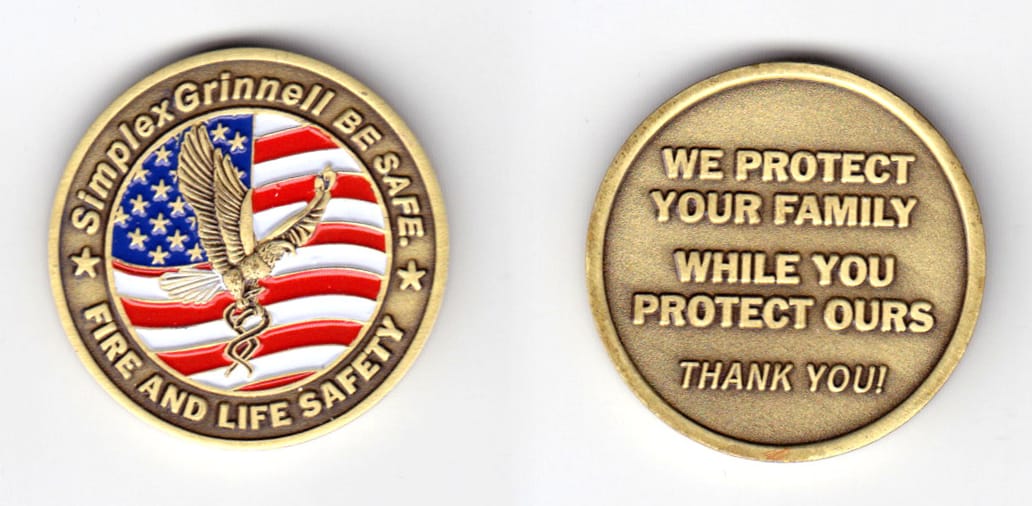 Round shaped coin, antique brass in color, 1 1/2 inches in diameter.