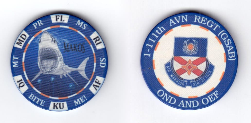 Round shaped poker chip, blue and white in color, 1 33/64 inches in diameter.