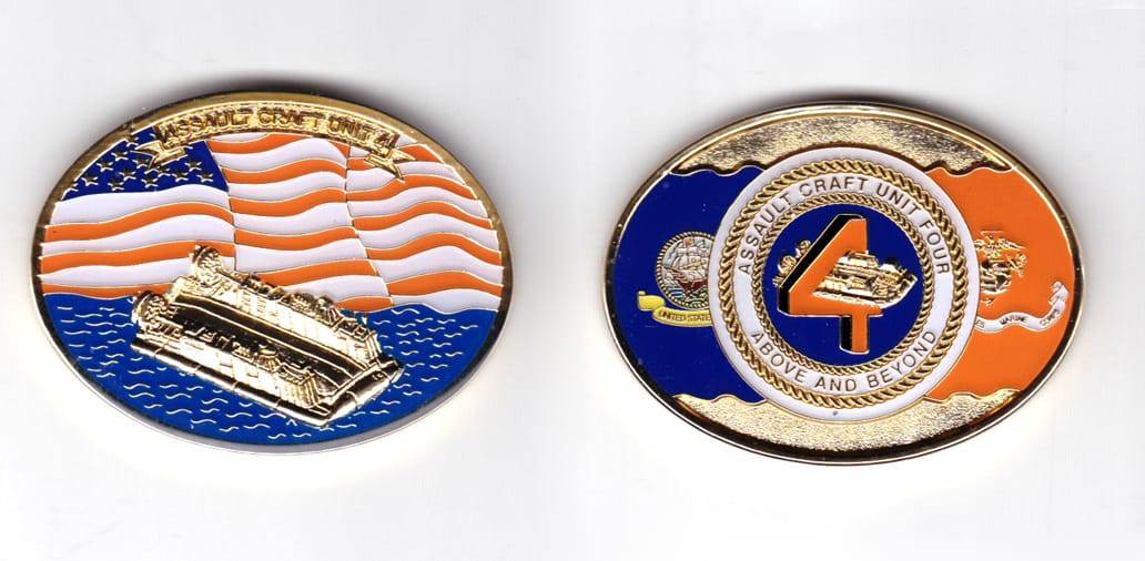 Oval shaped coin, brass in color, 1 45/64 inches high x 2 1/4 inches wide.