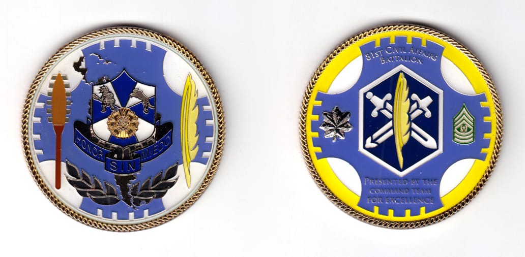 Round shaped coin, gold in color, 2 1/4 inches in diameter.