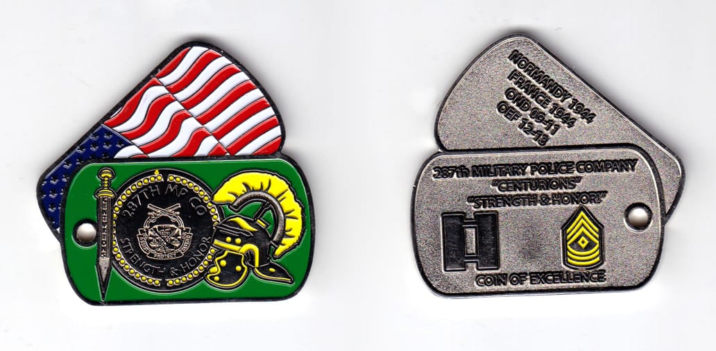 The coin is shaped like 2 dog tags: one behind the other, the front one horizontal and the bottom one partially obscured...