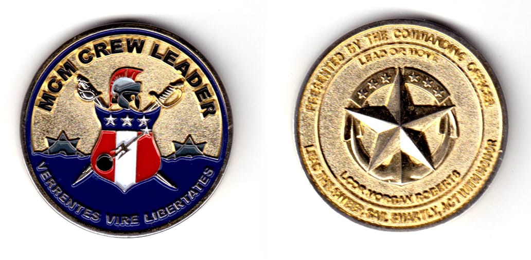 Round shaped c oin, brass in color, 1 49/64 inches in diameter.