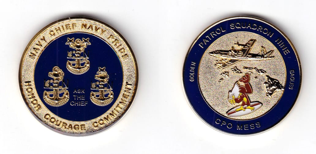 Round shaped coin, brass in color, 1 3/4 inches in diameter.