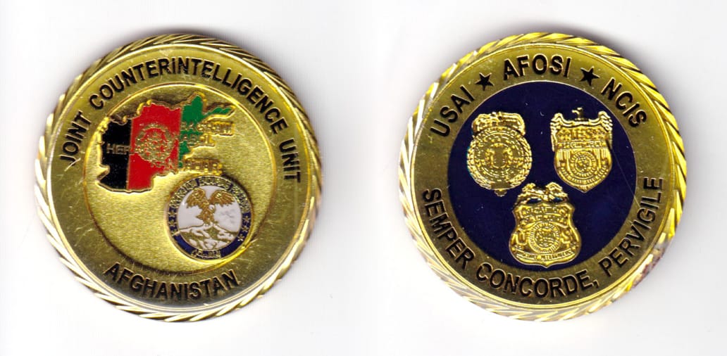 Round shaped coin, antique brass in color, 1 57/64 inches in diameter.