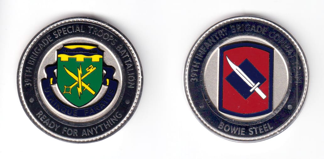 Round shaped coin, silver in color, 1 3/4 inches in diameter.