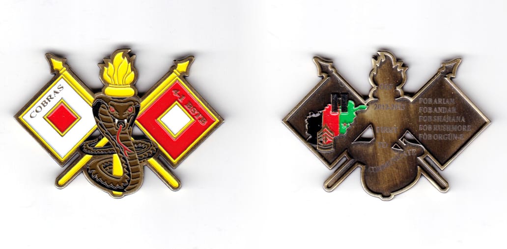 Coin is cobra shaped, rearing up; above, a flaming pot and; behind and extending out both sides, crossed spears with squ...