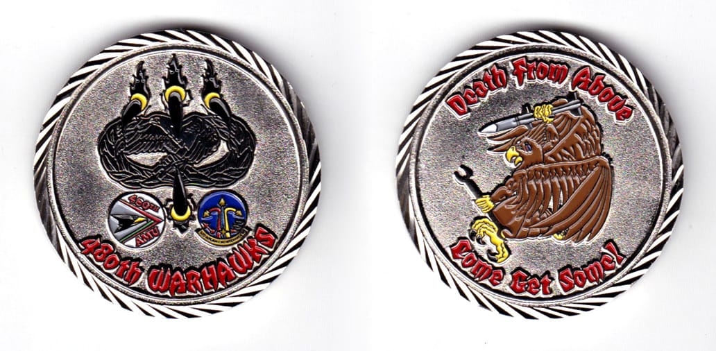 Round shaped coin, pewter in color, 1 3/4 inches in diameter.