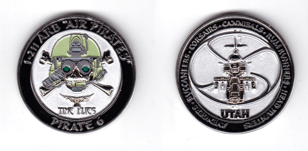 Round shaped coin, pewter in color, 1 3/4 inches in diameter.