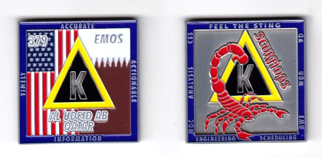 Square shaped coin, pewter in color, 1 47/64 inches high x 1 47/64 inches wide.