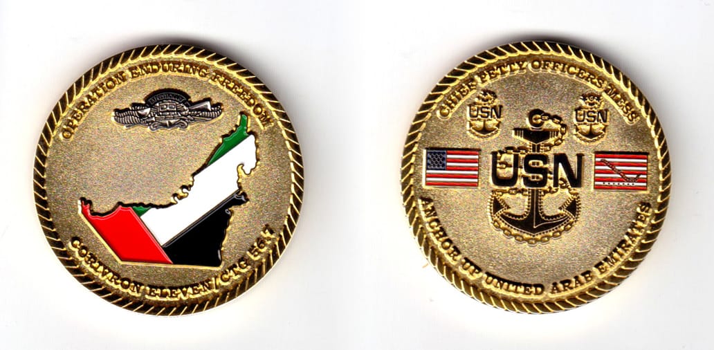 Round shaped coin, brass in color, 1 49/64 inches in diameter.