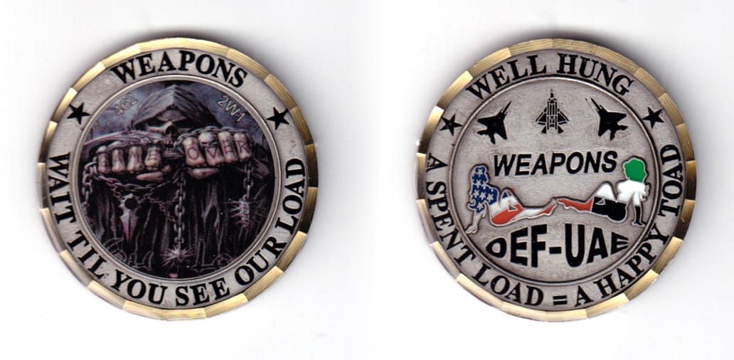 Round shaped coin, pewter in color, 1 3/4 inches in diameter.