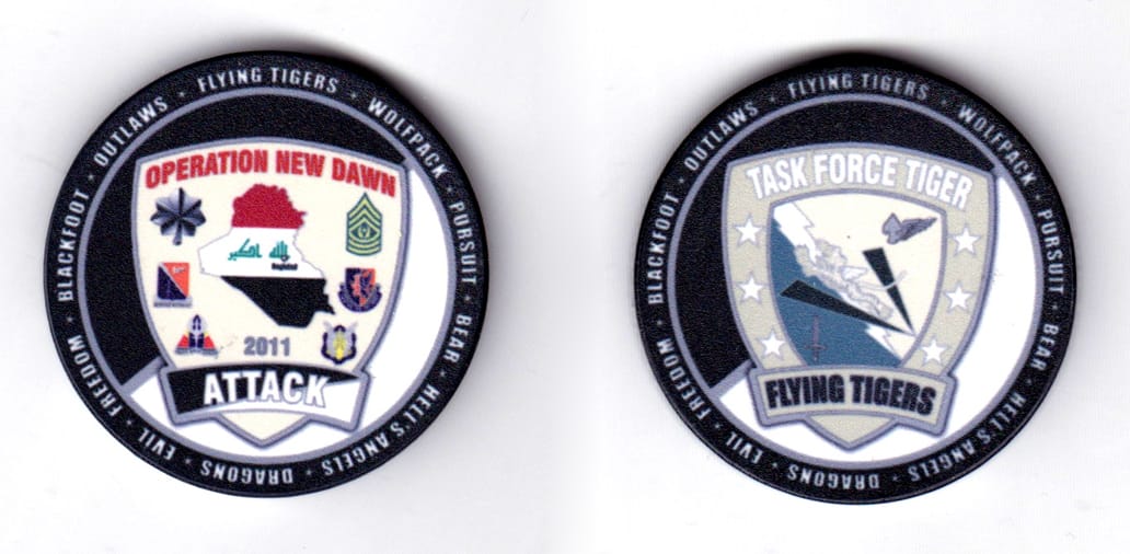 Round shaped poker chip, black & gray in color, 1 51/64 inches in color.