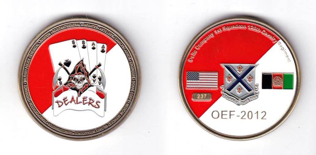 Round shaped coin, brass in color, 1 63/64 inches in diameter.