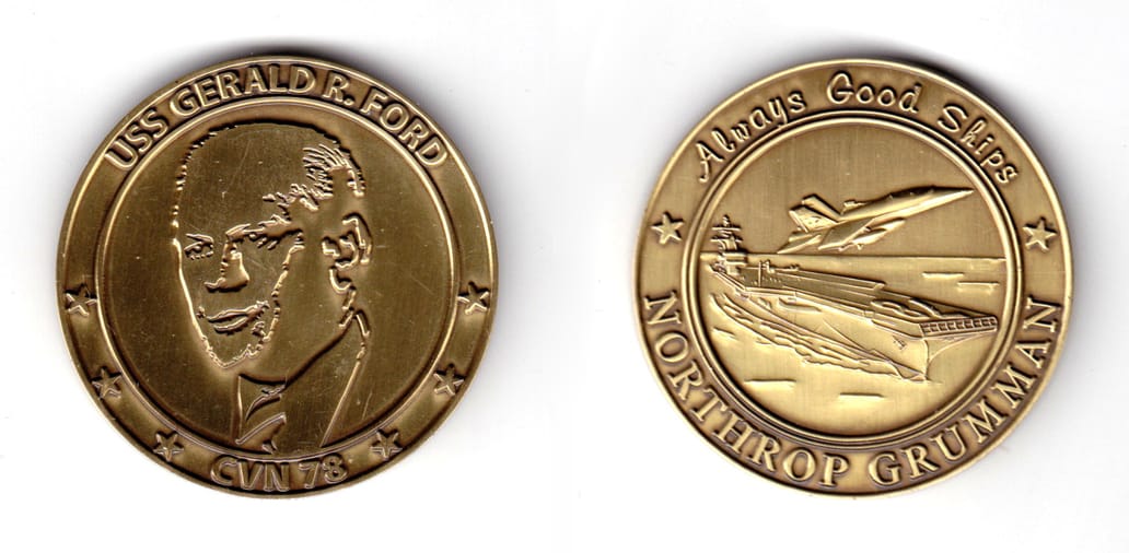 Round shaped coin, brass in color, 1 63/64 inches in diametr.