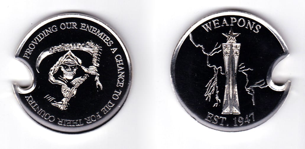 Round shaped coin with a notch cut out to make it a bottle opener, silver in color, 1 31/32 inches in diameter.