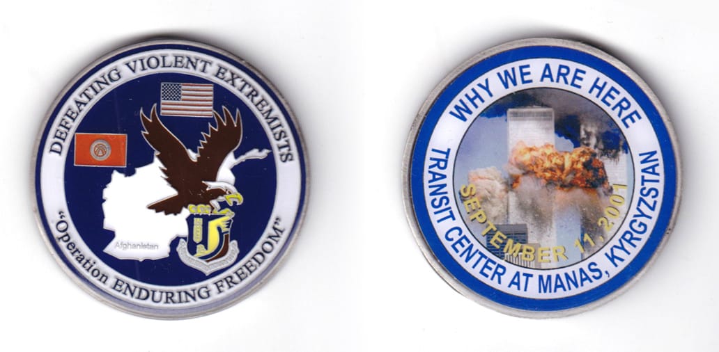 Round shaped coin, pewter in color, 2 inches in diameter.