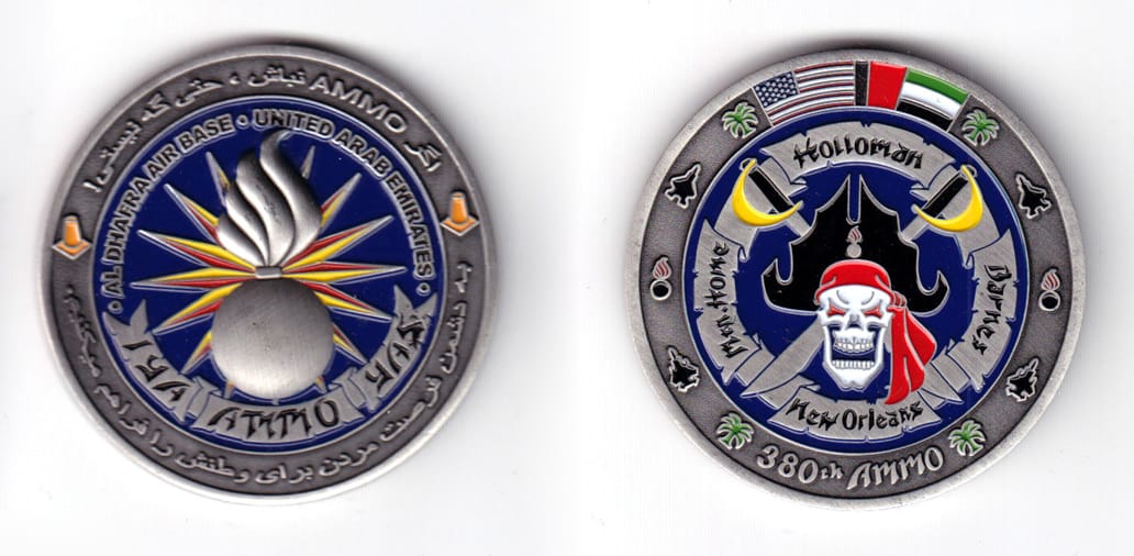 Round shaped coin, pewter in color, 2 1/64 inches in diameter.