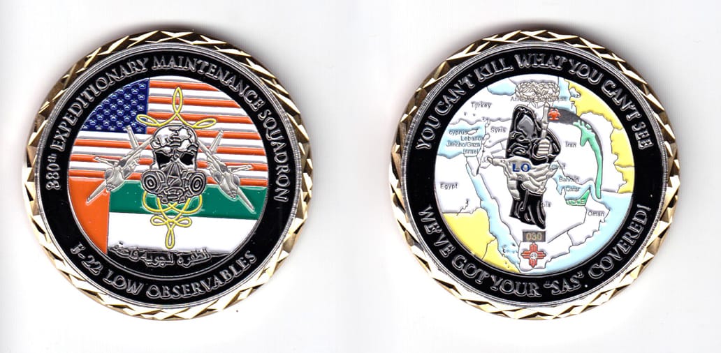 Round shaped coin, gold in color, 2 1/64 inches in diameter.