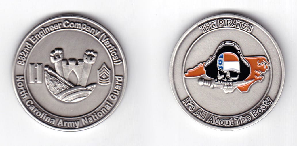 Round shaped coin, pewter in color, 1 37/64 inches in diameter.