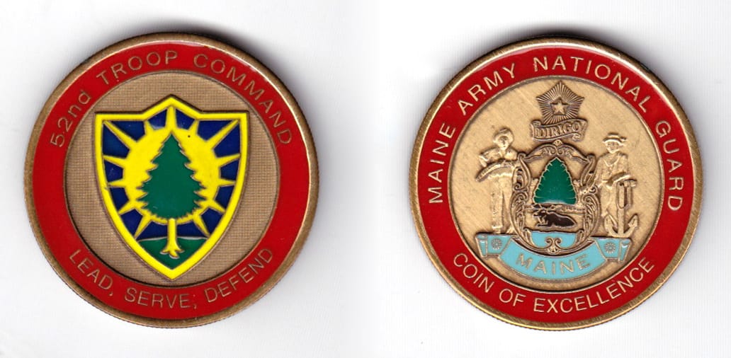 Round shaped coin, ver antique brass in color, 1 31/64 inches in diameter.