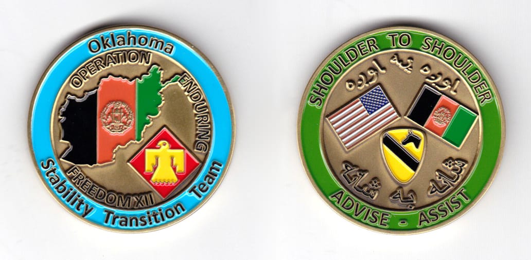 Round shaped coin, brass in color, 147/64 inches in diameter.