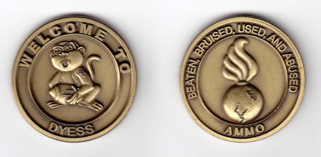 Round shaped coin, brass in color, 1 1/2inches in diameter.