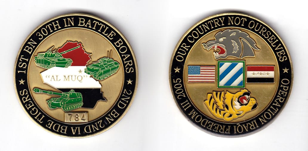 Round shaped coin, antique brass in color, 2 inches in diameter.